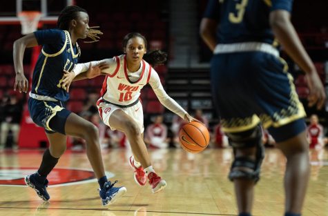 WKU freshman guard Acacia Hayes (10) drives for the net guarded by FIU redshirt freshman guard Guard Sifa Joyeuse (10) on Thursday, Jan. 26, 2023 during the matchup with FIU in E.A. Diddle Arena. WKU won 67-63 for a 7-0 streak. 