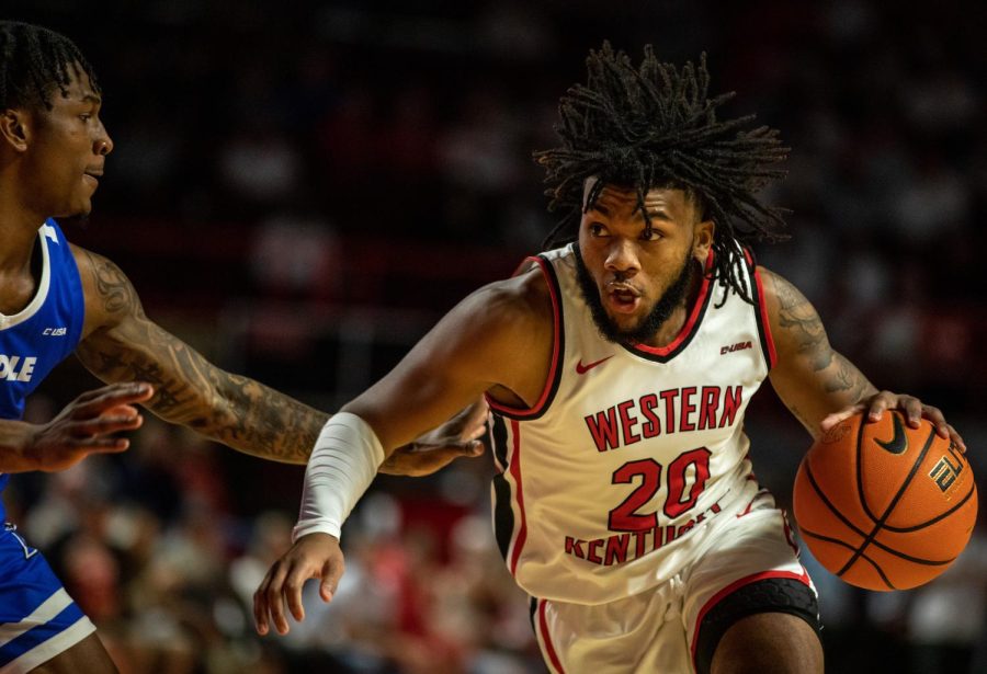 WKU+guard+Dayvion+McKnight+rushes+past+an+MTSU+player+towards+the+basket+during+the+WKU+v+MTSU+game+at+Diddle+Arena+in+Bowling+Green%2C+Ky.+on+Feb.+9%2C+2023.+WKU+won+93-89.