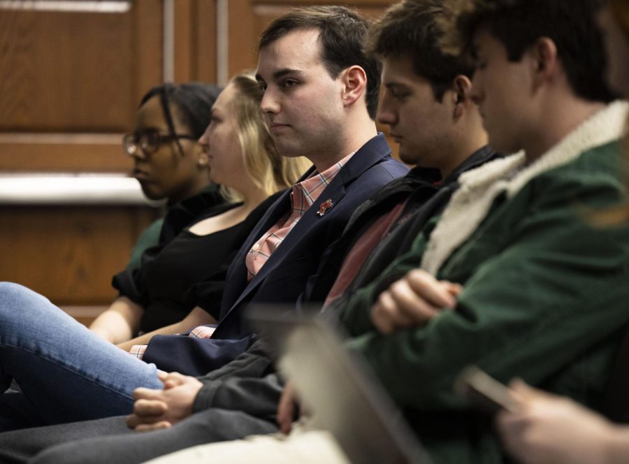 Western Kentucky University Student Government Association President Cole Bornefeld (center) waits to speak during a judicial hearing regarding accusations of publicly endorsing transphobic comments through an Instagram post in Downing Student Union on Friday, Feb. 17, 2023.