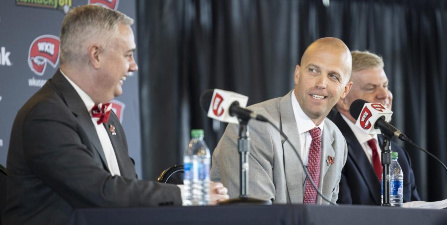 Steve Lutz (right) jokes with WKU President Timothy Caboni (left) while fielding questions during a press conference announcing his accession to head coach of the men’s basketball team in the Jack and Jackie Harbaugh Stadium Club building on Monday, March 20, 2023. Lutz made the move to WKU from Texas A&M Corpus Christi.