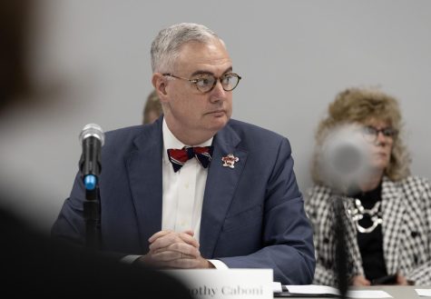 WKU President Timothy C. Caboni listens to a speaker during the quarterly Board of Regents meeting at the WKU Innovation Campus on Friday, March 3, 2023.