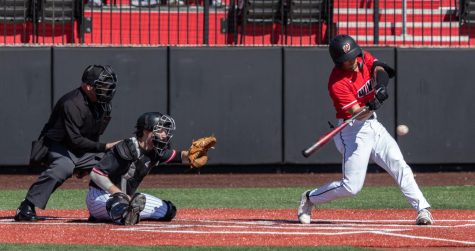 WKU redshirt junior outfielder Ty Crittenberger (3) makes a swing during the first round of a double-header against the NIU Huskies Saturday, March. 4, 2023 at Nick Denes Field. WKU won the first match 9-8.