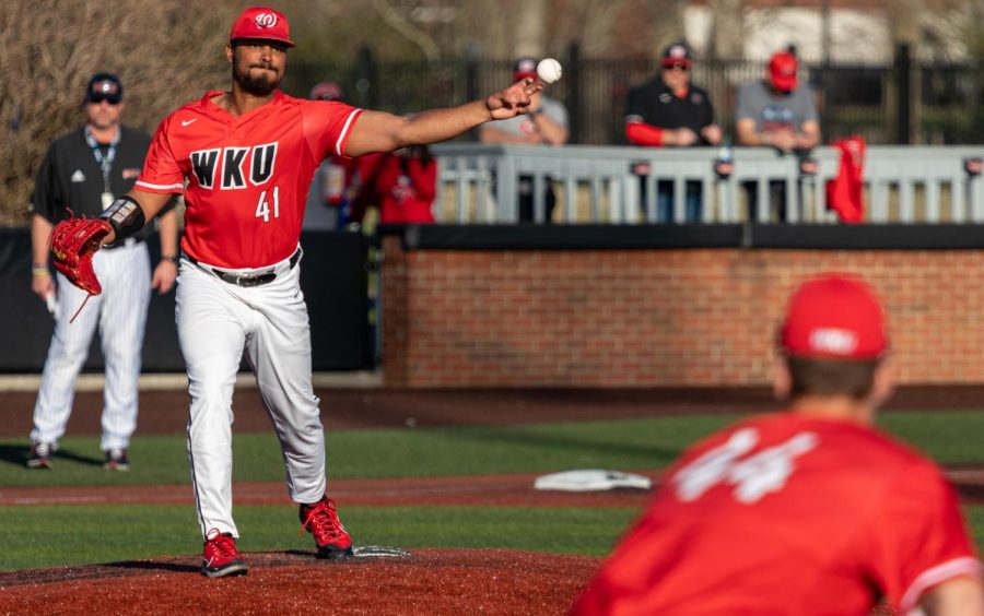 WKU junior pitcher Lane Diuguid (41) throws to sophomore Ty Batusich (44) at first base to check a runner during the second round of a double-header against the NIU Huskies Saturday, March. 4, 2023 at Nick Denes Field. WKU won the second match 7-5.