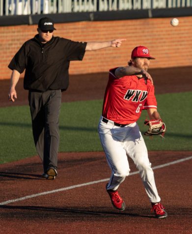 WKU junior infielder Aidan Gilroy (6) throws the ball from third during the second round of a double-header against the NIU Huskies Saturday, March. 4, 2023 at Nick Denes Field. WKU won the second match 7-5.