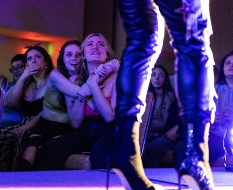 Sophie Shuck watches drag queen Veronika Electronika deliver a performance to “Jolene” by Dolly Parton at the 2023 WKU Housing and Residence Life Drag Show on Thursday, April 6, 2023.
