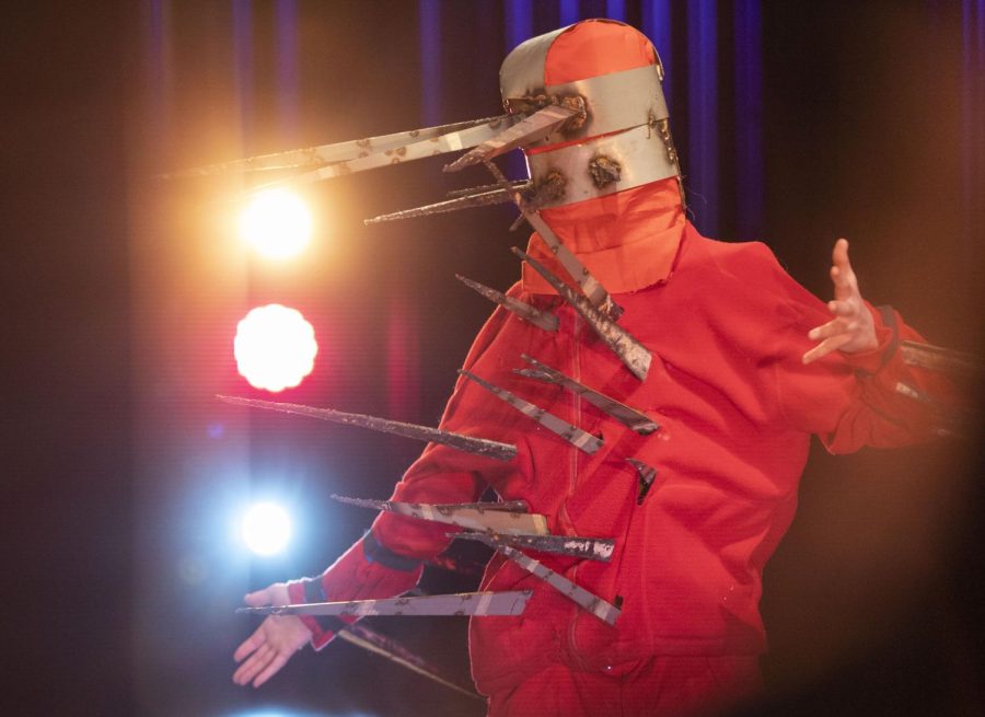 A performer wears a costume covered in metal spikes during the performance of “El Aquacte” during The Menagerie: An Opera Gala on Sunday, April 2, 2023 in Van Meter Hall.