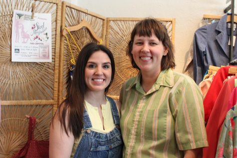 Brandy Tucker, shop manager (left), and Amber Brooks, owner (right), pose in their vintage store located on Fountain Square, Becky Brooks Vintage.