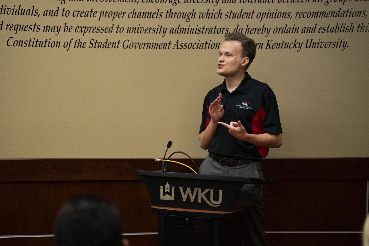 Director of Public Relations Preston Romanov tells the SGA senators about their official Instagram account reaching 2000 followers in the SGA chambers in Bowling Green, Ky. on Aug. 29, 2023. 