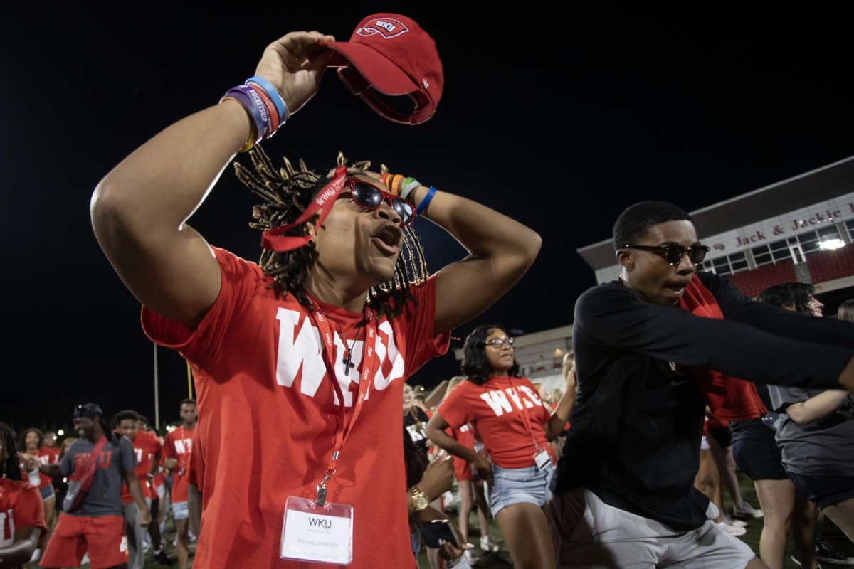 WKU students dance on the football field at Houchins-Smith Stadium during M.A.S.T.E.R. Plan on Aug. 18, 2023.