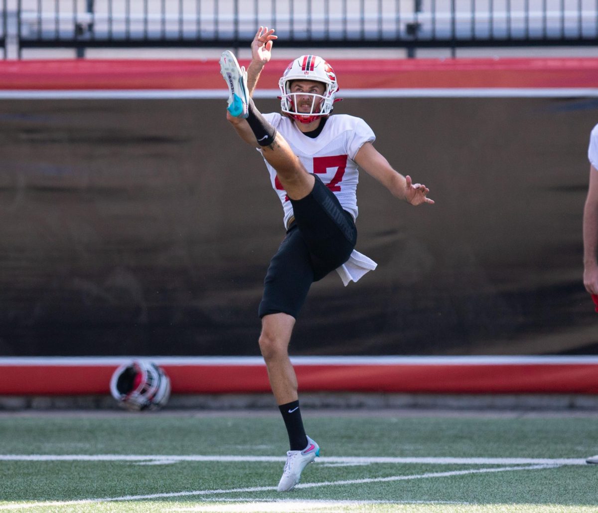 Tom Ellard practices his punts during WKU’s practice at Feix Field in Bowling Green, Ky. on Tuesday, August 29, 2023. 