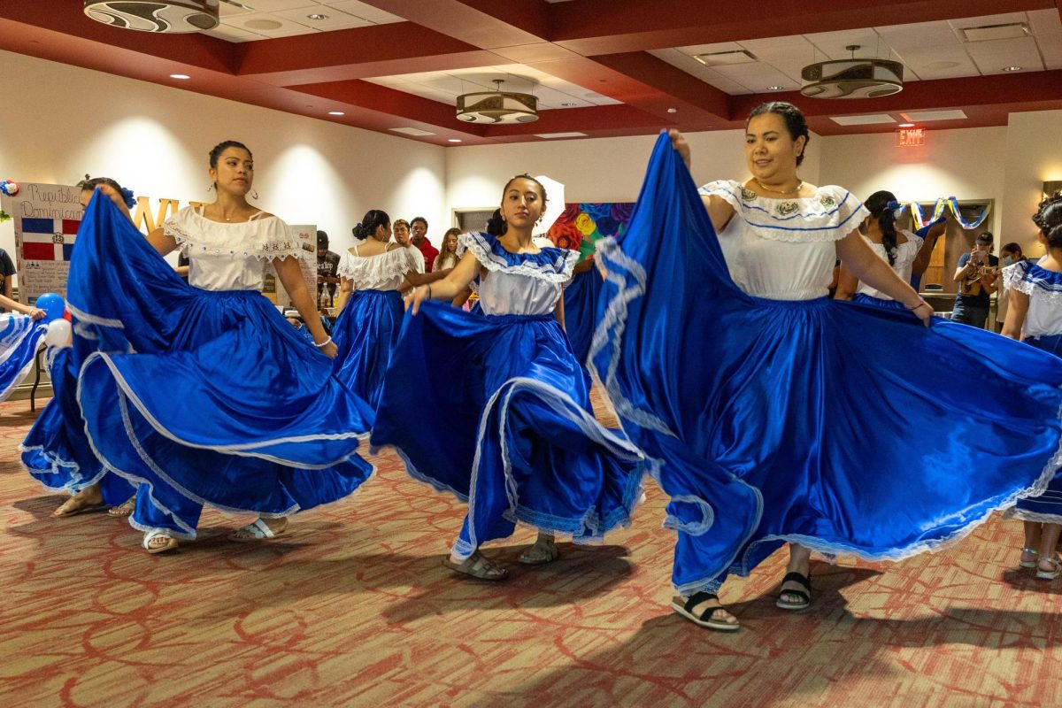 A+group+of+El+Salvadorian+dancers+perform+at+the+All+Around+the+World+event+in+the+Honors+College+and+International+Center+on+Sept.+14%2C+2023.