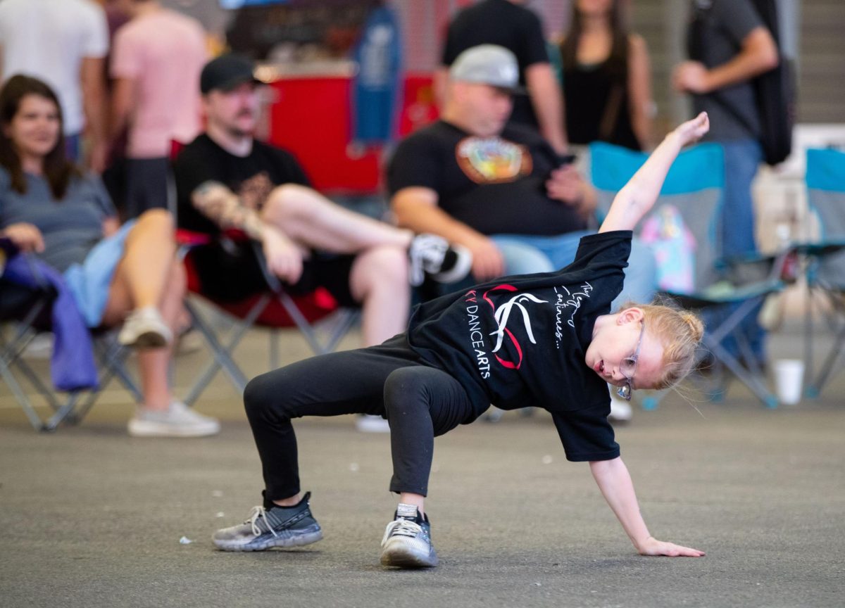 SOKY Dance Arts performer Lexie Dugard, 7, dances during AmpliFest at the SOKY Marketplace in Bowling Green on Saturday, Sept. 9, 2023. 