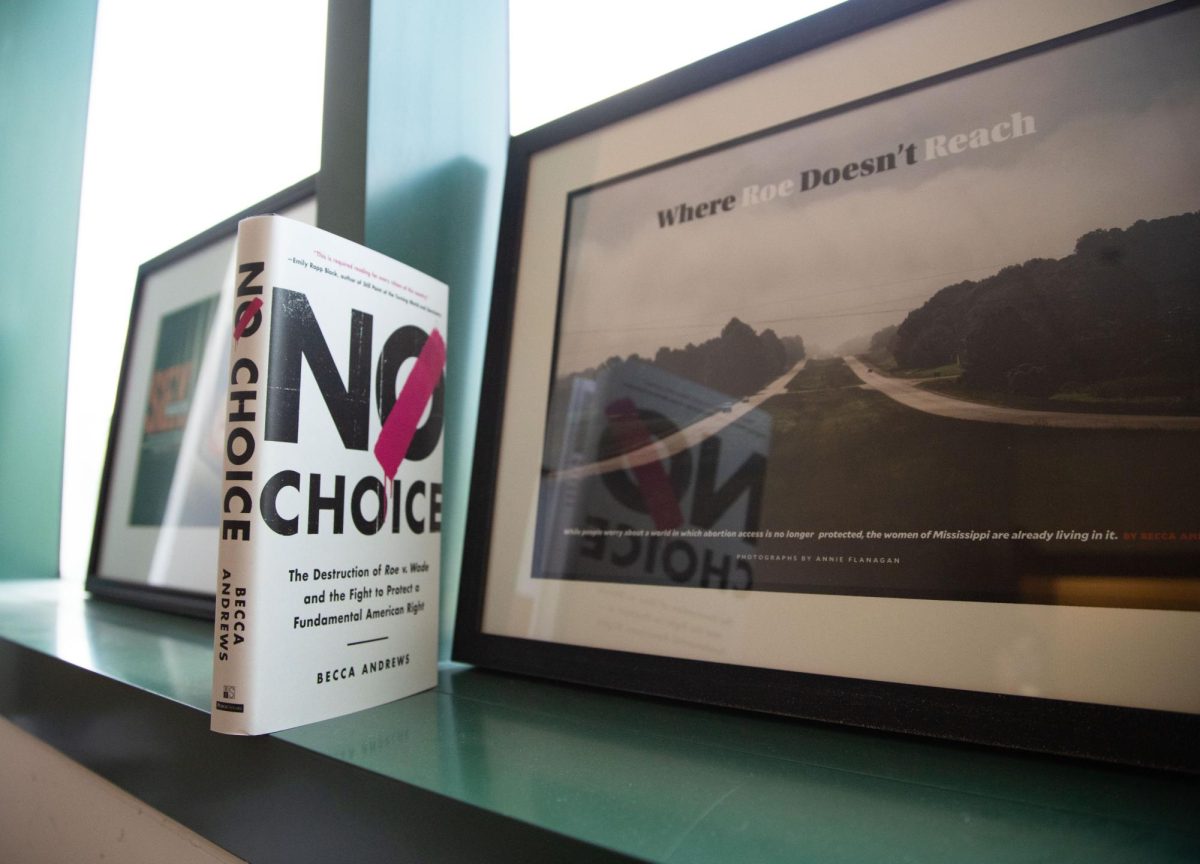 Assistant Professor Becca Andrews’ book “No Choice” next to her news spread related to her book in her office at Jody Richards Hall on WKU’s campus in Bowling Green on Friday Sept. 1, 2023. 