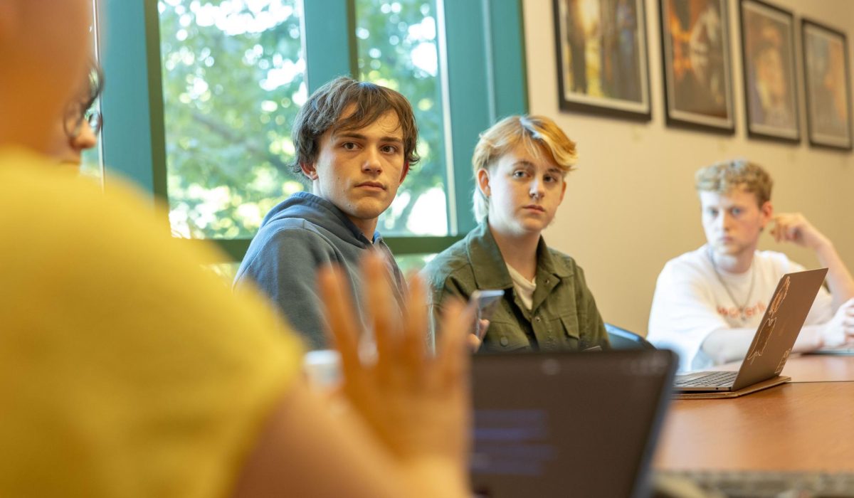 Nico Silverthorn and Haley Magnuson listen to assistant film professor Shaina Feldman address concerns about budgeting during a meeting about the Coca-Cola Refreshing Films program in Jody Richards Hall on Sept. 14, 2023. If selected as a finalist, students will receive $20K to produce their short film.