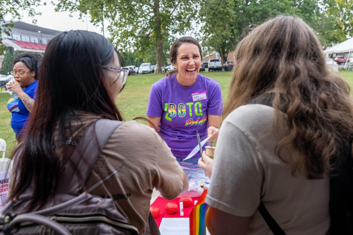 Katie Knackmuhs, a therapist at WKU’s counseling center, interacts with students at Pride on the Lawn at Western Kentucky University on Sept. 7, 2023.