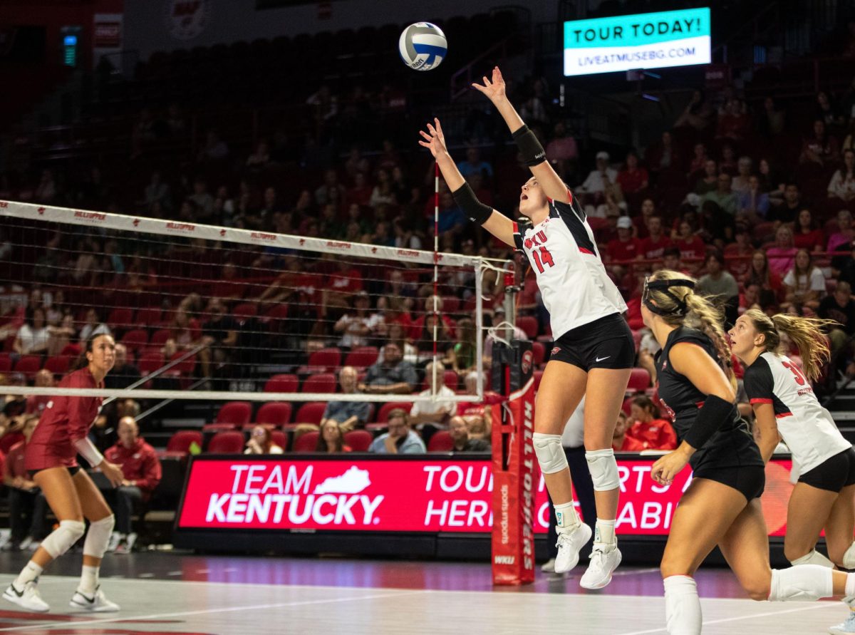 Setter Callie  Bauer sets the ball during the WKU Volleyball match against University of Arkansas at the E.A Diddle Arena in Bowling Green on Wednesday, Sept. 8, 2023. 