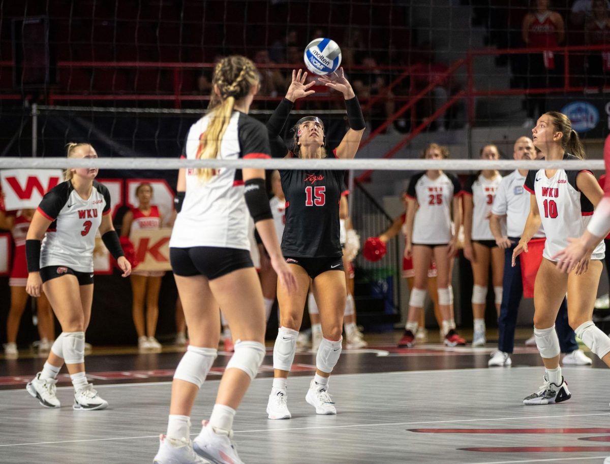 Defensive Specialist Abby Schaefer sets the ball during the WKU Volleyball match against University of Arkansas at the E.A Diddle Arena in Bowling Green on Wednesday, Sept. 8, 2023. 