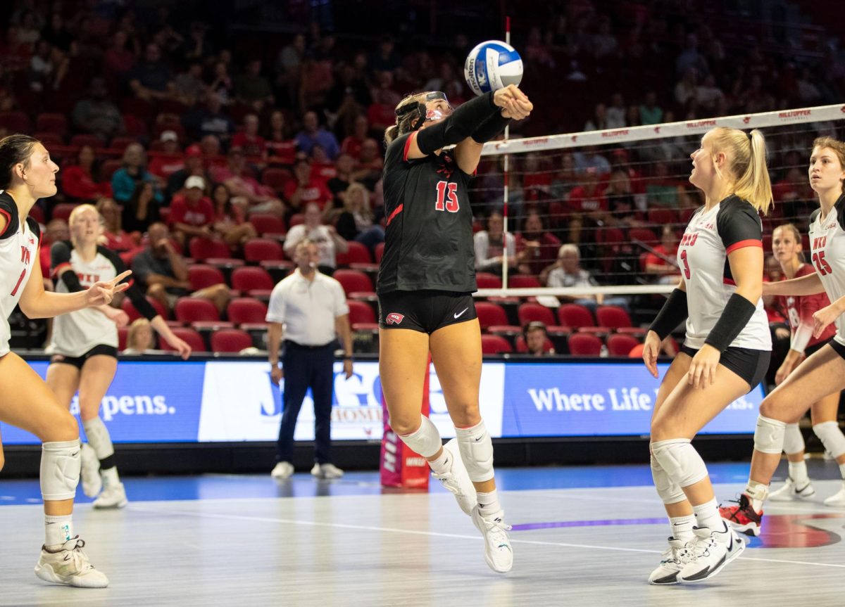 Defensive Specialist Abby Schaefer bumps the ball during the WKU Volleyball match against University of Arkansas at the E.A Diddle Arena in Bowling Green on Wednesday, Sept. 8, 2023. 