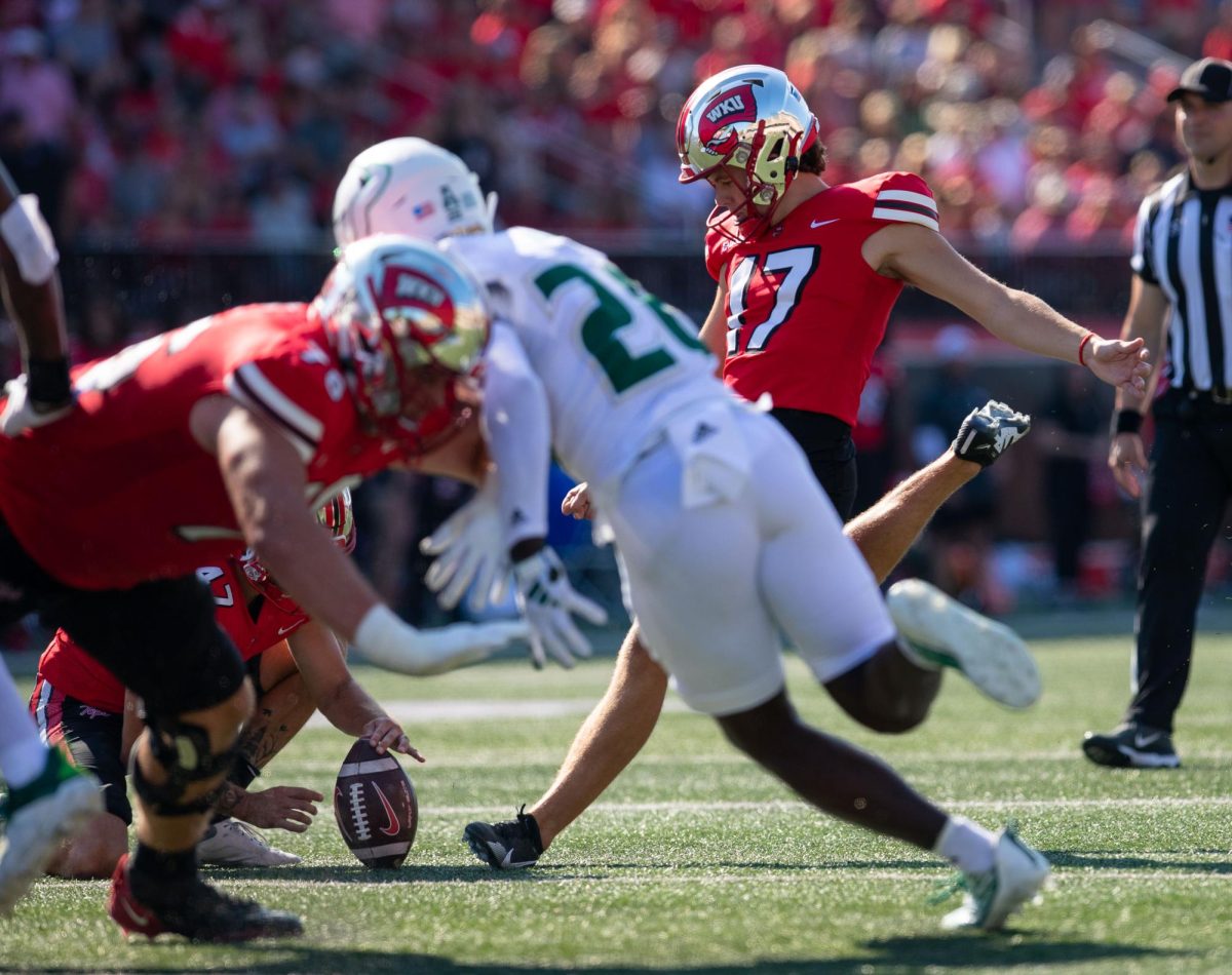 Kicker Lucas Carneiro kicks a field goal during a game against University of South Florida at Smith Stadium in Bowling Green, Ky. on Saturday, Sept. 2, 2023. 