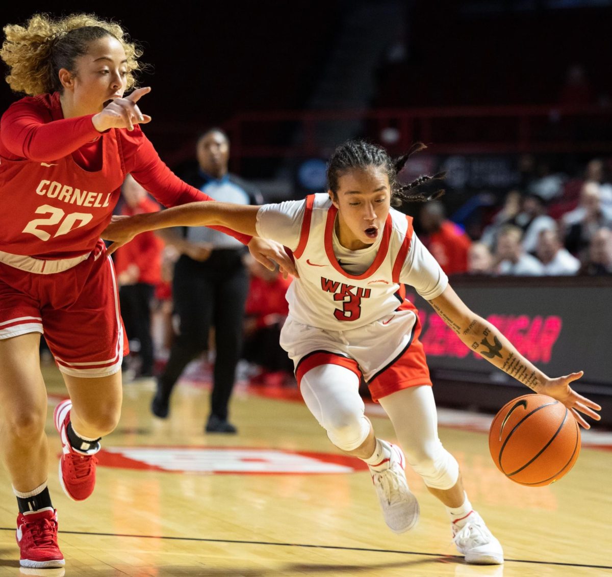Guard Alexis Mead (3) drives the lane during a game against Cornell University in the Diddle arena on Monday, Nov. 13, 2023.