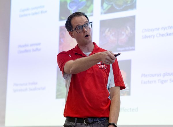 Assistant professor Joseph Marquardt speaks during his “There and Back Again, a Professor’s Journey” speech at the Mahurin Honors College on Tuesday, Nov. 7, 2023. Marquardt currently teaches in the biology department and is an Honors College Alum. 