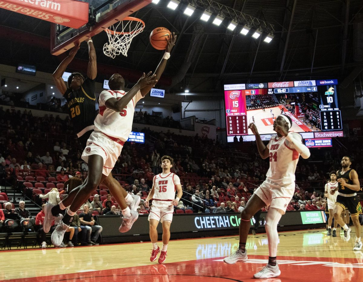 Forward+Babacar+Faye+%285%29+drives+in+the+paint+for+two+points+during+the+game+against+Kentucky+State+on+Nov.+18%2C+2023+at+E.A.+Diddle+Arena.