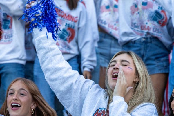 A student cheers with her sorority before the WKU Homecoming Parade on Nov. 10, 2023.
