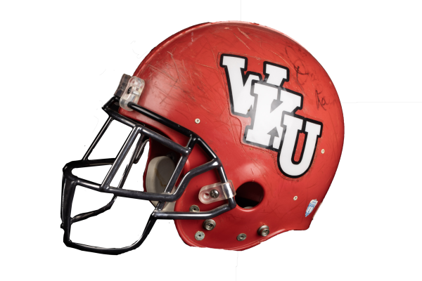 This helmet was signed by Joe Bugel, who played for WKU from 1960-1963 before joining the Hilltoppers coaching staff as a graduate assistant. Bugel went on to coach in the NFL and helped lead the Washington Redskins to three Super Bowl wins. He also coached for the Detroit Lions, the Houston Oilers, and the San Diego Chargers. He aalso served as a head of the Phoenix Cardinals and Oakland Raiders. This helmet was made for a team in the mid 1990s that Bugel signed. Bugel died in 2020. (Sue Strader)