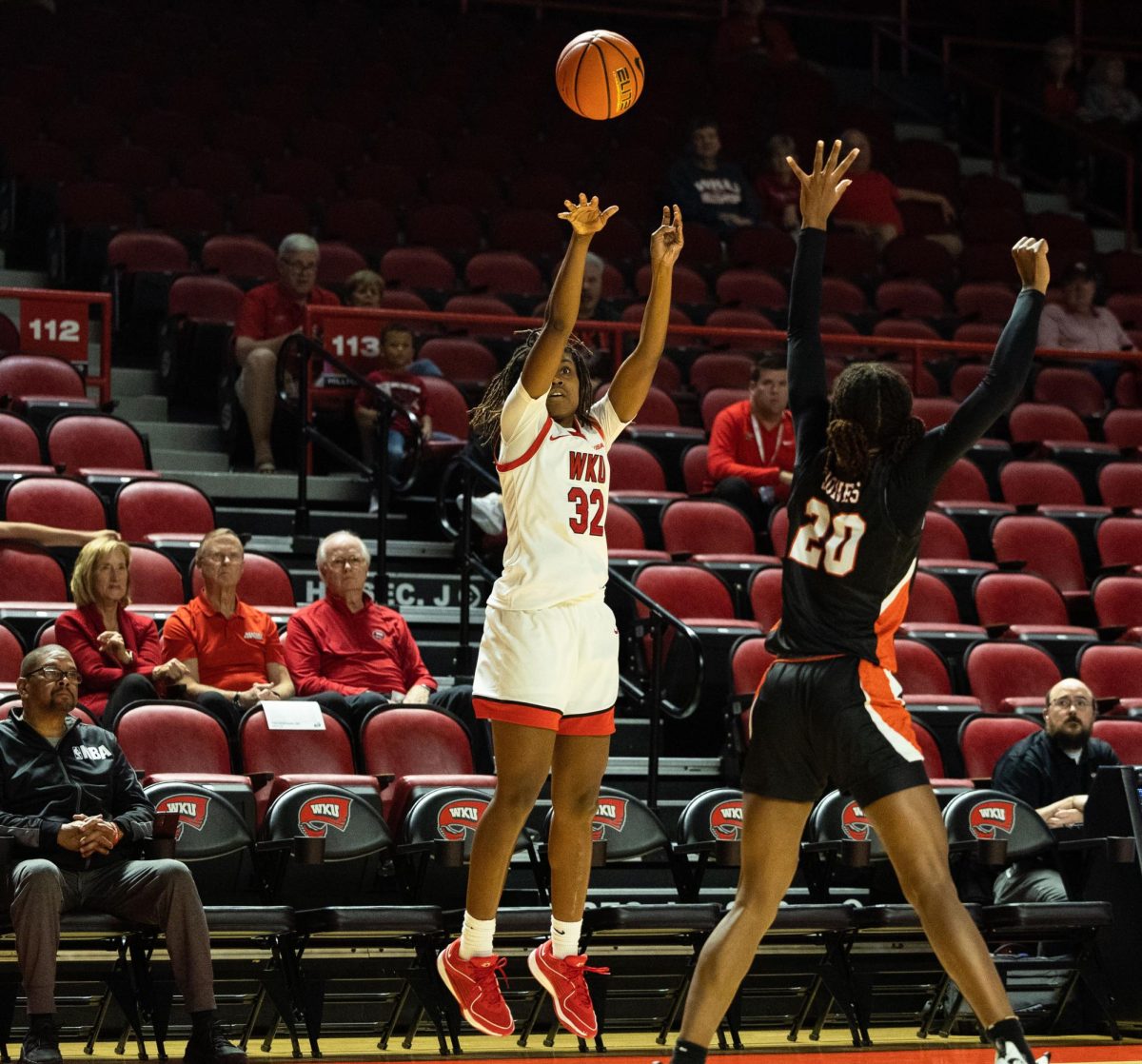 Guard Karris Allen (32) shoots a three pointer during a game against the Mercer Bears in the Diddle arena on Monday, Nov. 6, 2023.