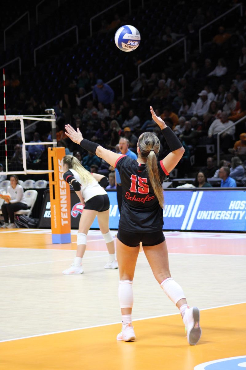 Defensive Specialist Abby Shaefer serves in the second set against Coastal Carolina in the NCAA Division I Volleyball Championship. WKU defeated Carolina in three sets.