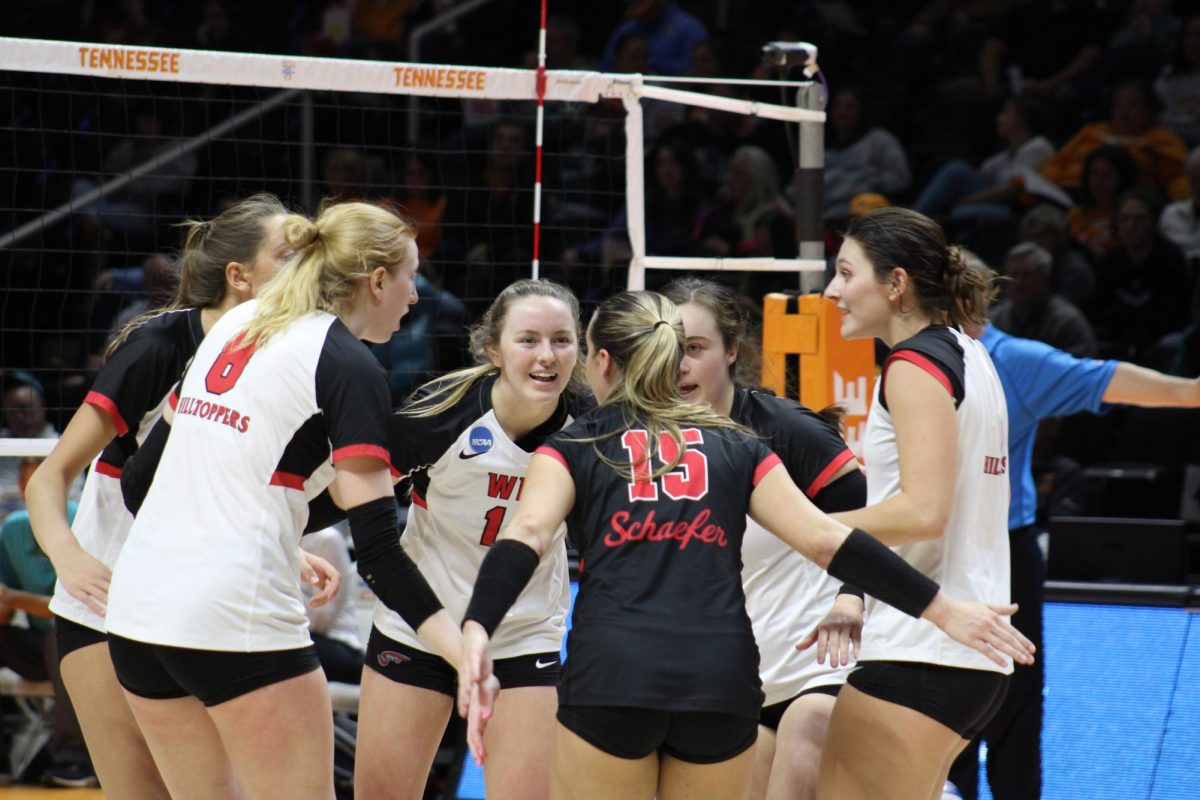 The+Hilltoppers+celebrate+a+point+during+their+match-up+against+Coastal+Carolina+University+on+Dec.+1%2C+2023.+WKU+posted+a+.478+hitting+percentage+over+the+three+sets.