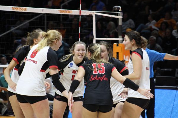 The Hilltoppers celebrate a point during their match-up against Coastal Carolina University on Dec. 1, 2023. WKU posted a .478 hitting percentage over the three sets.
