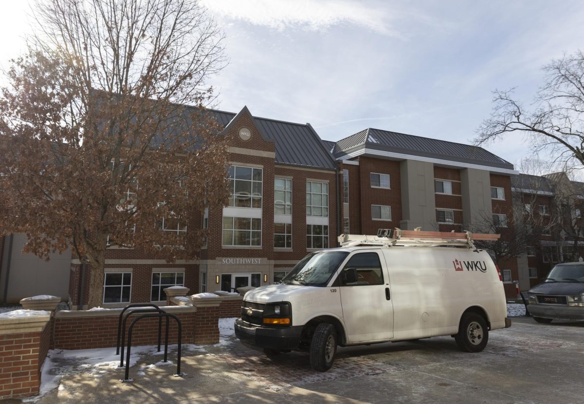 A WKU maintenance van is parked outside of Southwest Hall in response to a sprinkler pipe burst on Sunday, Jan. 21.