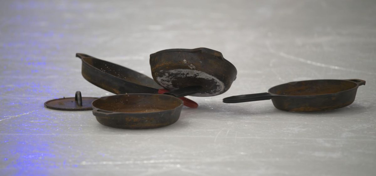 As the skillets get colder they become more slippery and slide easier across the ice. This leads to throws where one pan jumps two others to come to a rest.