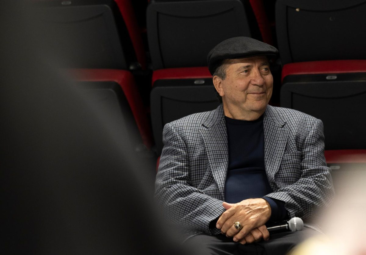 Johnny Bench sits back to watch his friend and songwriter Lee Thomas Miller sing live at “A Night With Baseball Hall of Famer Johnny Bench”, WKU’s Baseball’s First Pitch Banquet in the Diddle Arena on Saturday, Jan. 27.