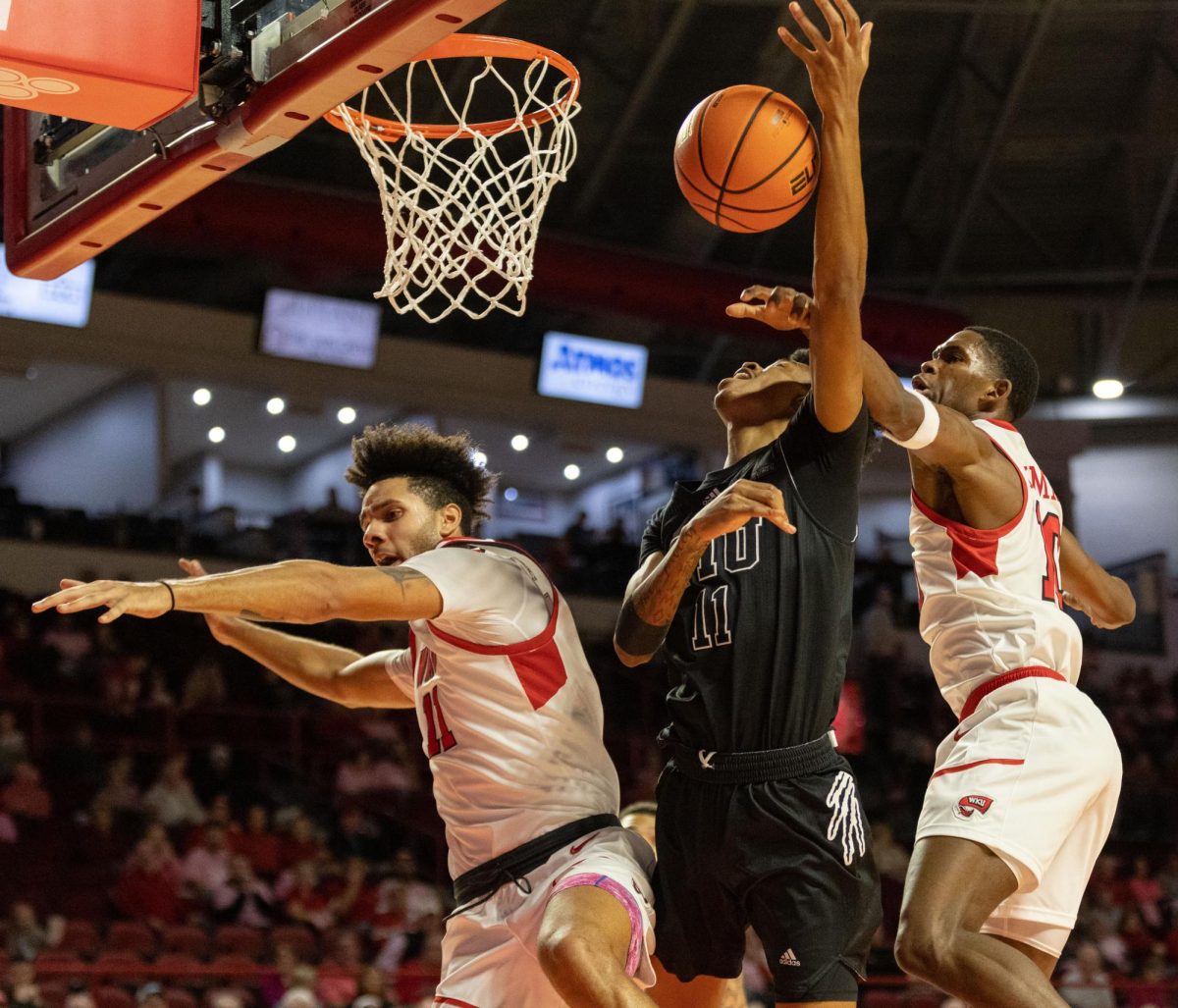 Guard Brandon Newman blocks an FIU layup during a home game against the Florida International University in the Diddle arena on Thursday, Jan. 25, 2024. 