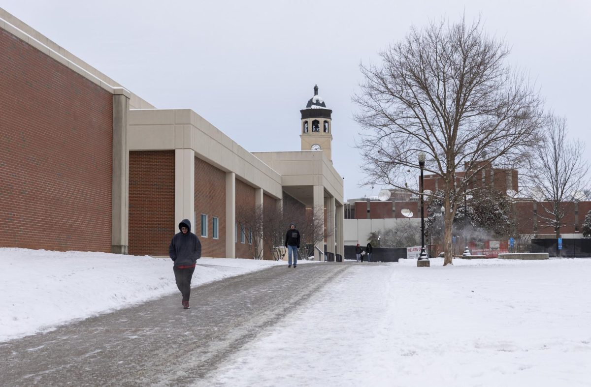 Students walk past the Preston Center in the below-freezing temperatures on Jan. 15, 2024.