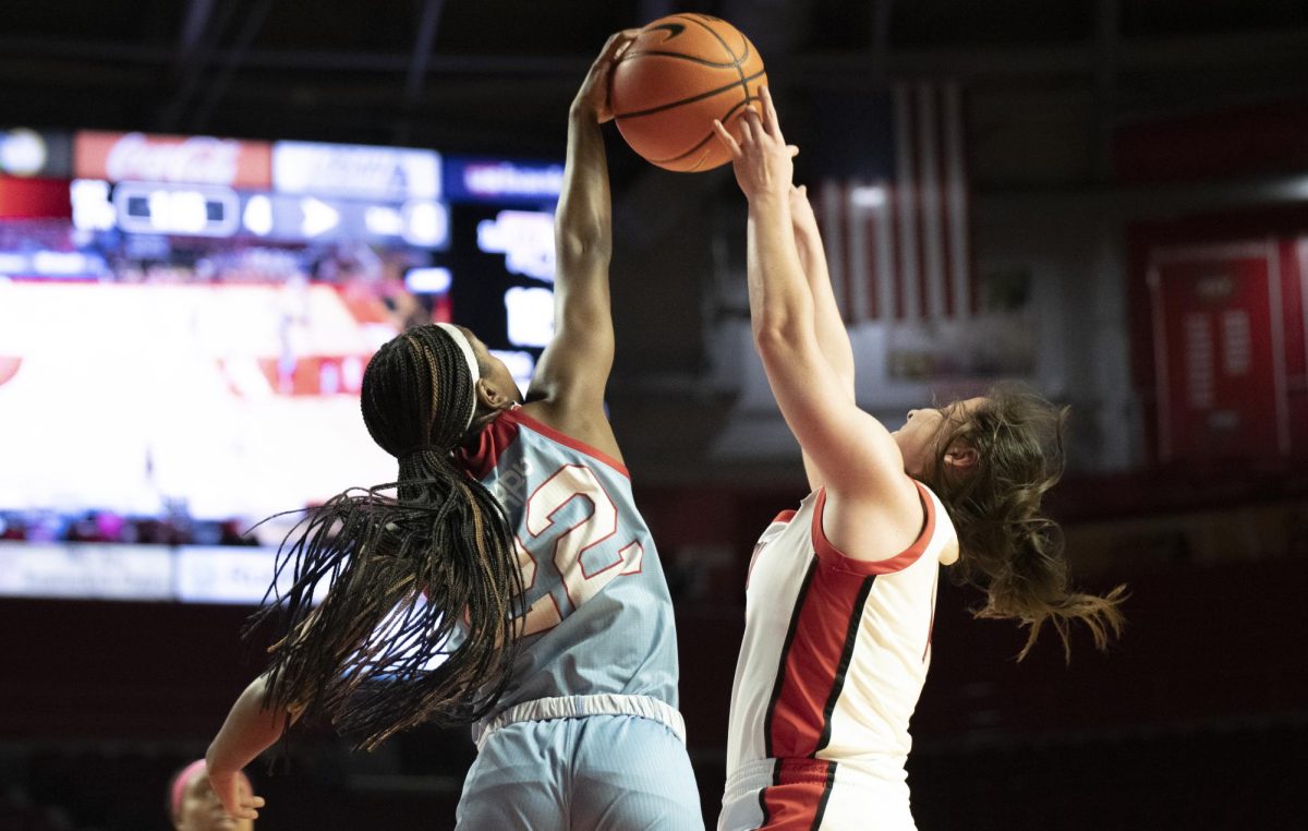 Guard Teresa Faustino (14) battles for the ball during WKUs game against La Tech on Wednesday, Feb. 7. Faustino scored 11 points and WKU won 64-56. 