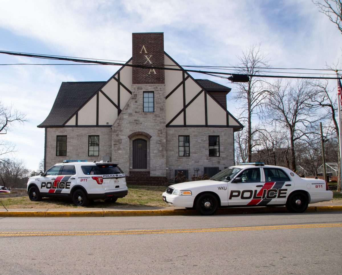 Police are seen outside the Lambda Chi Alpha house adjacent to WKU’s campus on Wednesday, Feb. 7. 