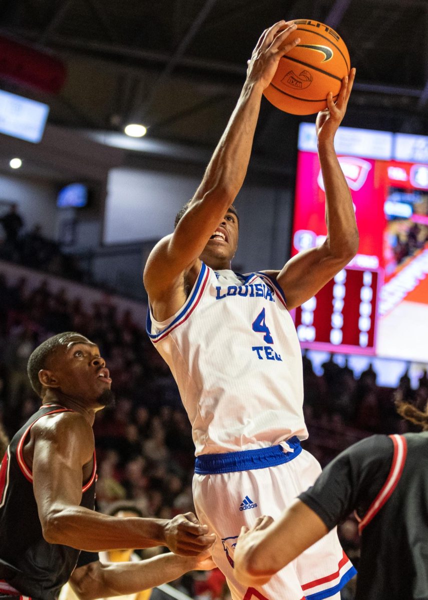 LA Techs guard Sean Newman Jr. (4) goes up for a layup during a game against WKU at the E.A Diddle Arena on Wednesday, Feb. 28, 2024. 
