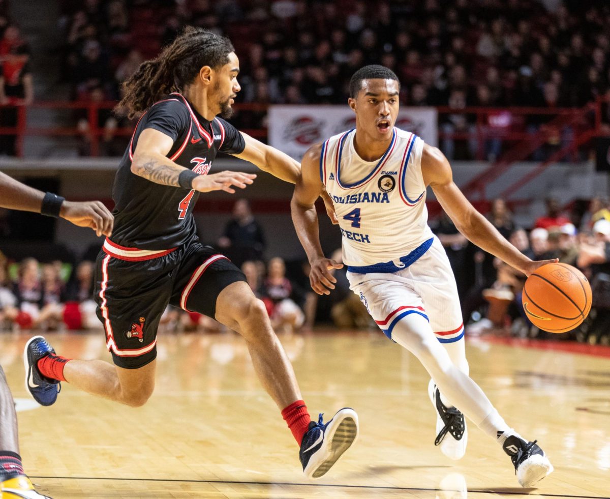 LA Techs guard Sean Newman Jr. (4) drives the lane during a game against WKU at E.A Diddle Arena on Wednesday, Feb. 28, 2024. 
