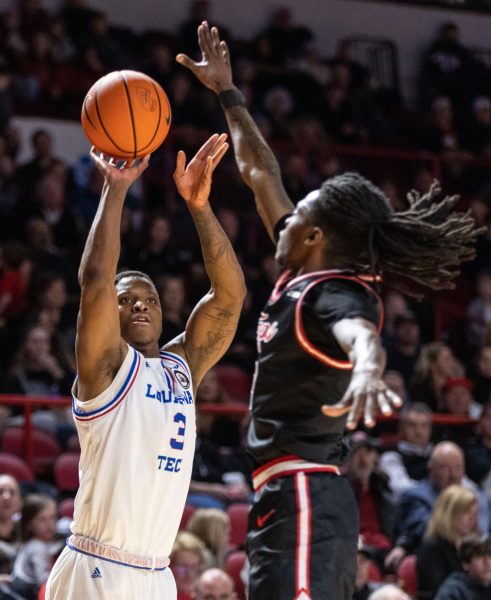 LA Techs guard Tyler Henry (3) shoots a field goal during a game at E.A Diddle Arena on Wednesday, Feb. 28, 2024. 
