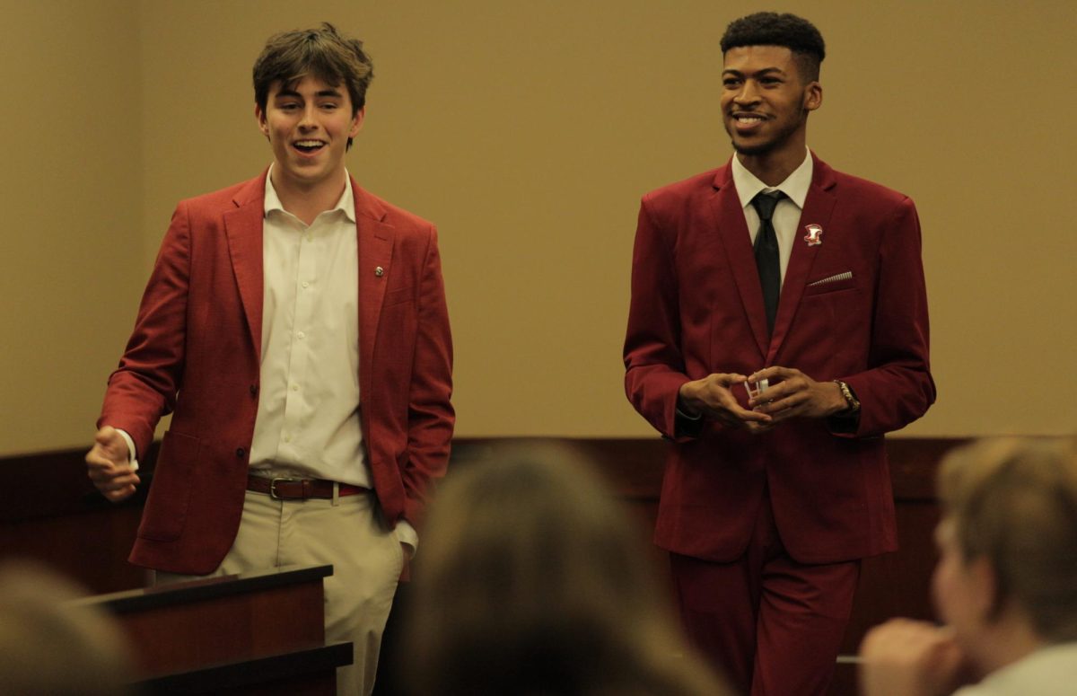 Student Body President Sam Kurtz (left) and Chief of Staff Donte Reed (right) present their Uber voucher program to the SGA senate during their weekly meeting on Tuesday, Feb. 13.
