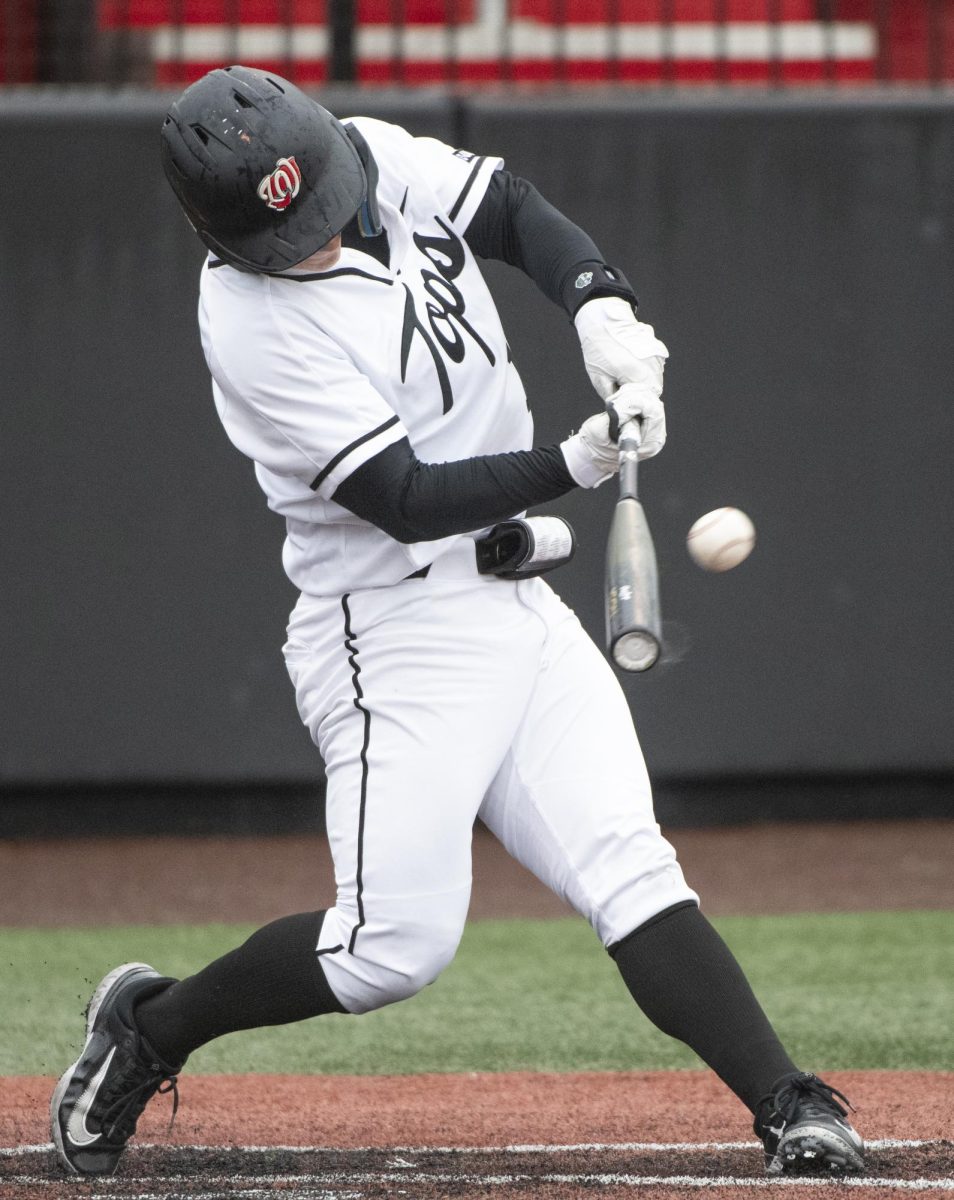 Brady Browning (15) hits a home-run during Western Kentucky Universitys games against University of Wisconsin, Milwaukee on Friday, March 8, 2024. 