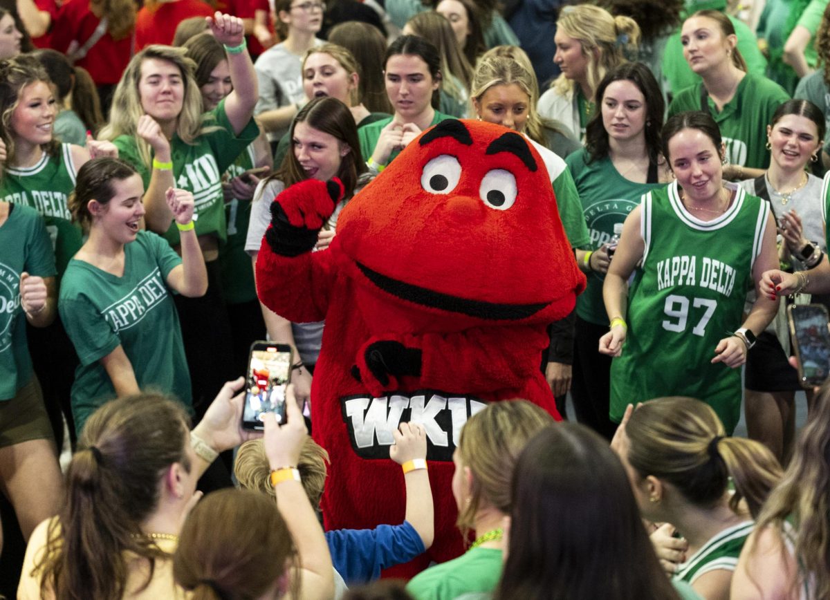 Big Red dances in the middle of sorority Kappa Delta’s dance circle at Dance Big Red in Preston Center on Friday, March 8.