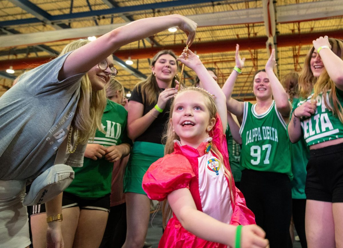 Sophomore Ally Bobb spins Mackenzie Davis, 7, while dancing during Dance Big Red 2024 at the Preston Center on Friday, March 8. The event raised 93,851.99 for Norton Childrens Hospital in Louisville, Ky.