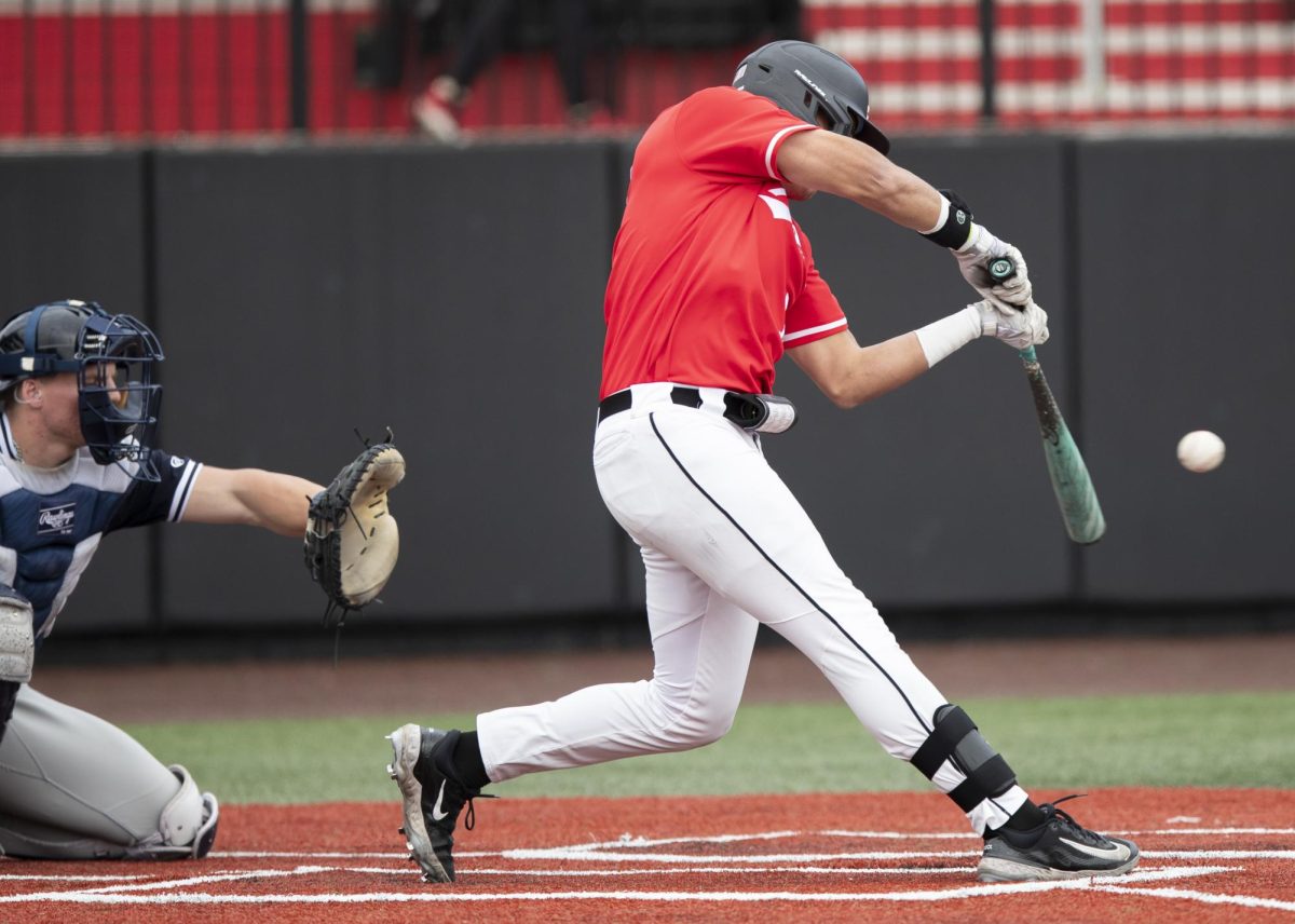 Outfielder Cristian Garcia (17) hits a fly ball during WKU’s game against Dallas Baptist University on Sunday, April 7, 2024.