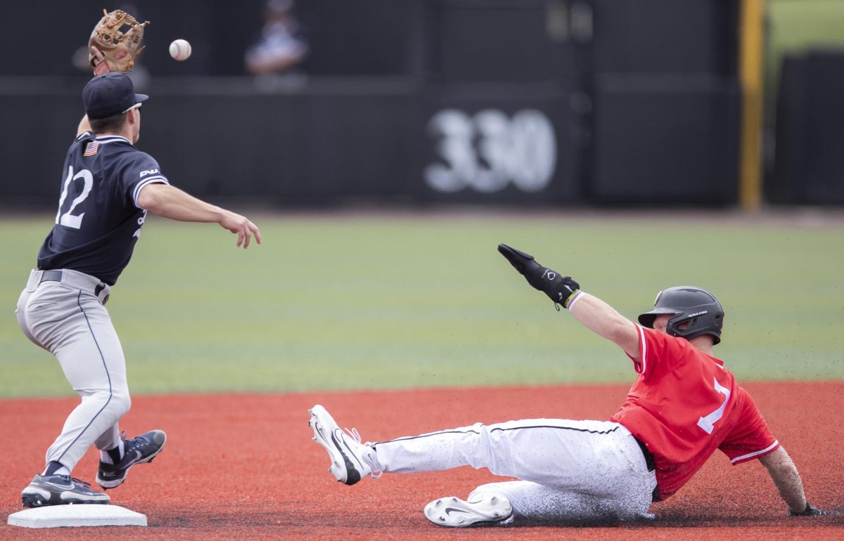 Outfielder Caleb Marmo (7) slides into second base for an out during WKU’s game against Dallas Baptist University on Sunday, April 7, 2024. 