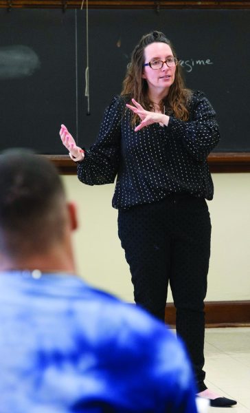 Kate Brown, history professor, talks to her class in Cherry Hall room 204 on Friday, Feb. 23.