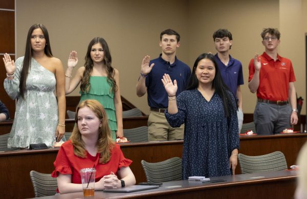 Newly-elected senators are sworn in to SGA at the first meeting of the 24th Senate on Tuesday, April 23 in the Senate Chambers in the Downing Student Union.